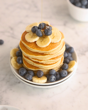 Syrup drizzling on a stack of cottage cheese pancakes: healthy recipe
